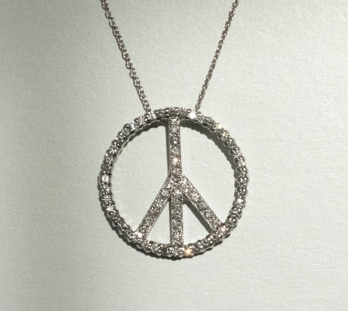 Why the Peace Symbol Endures in Fine Jewelry