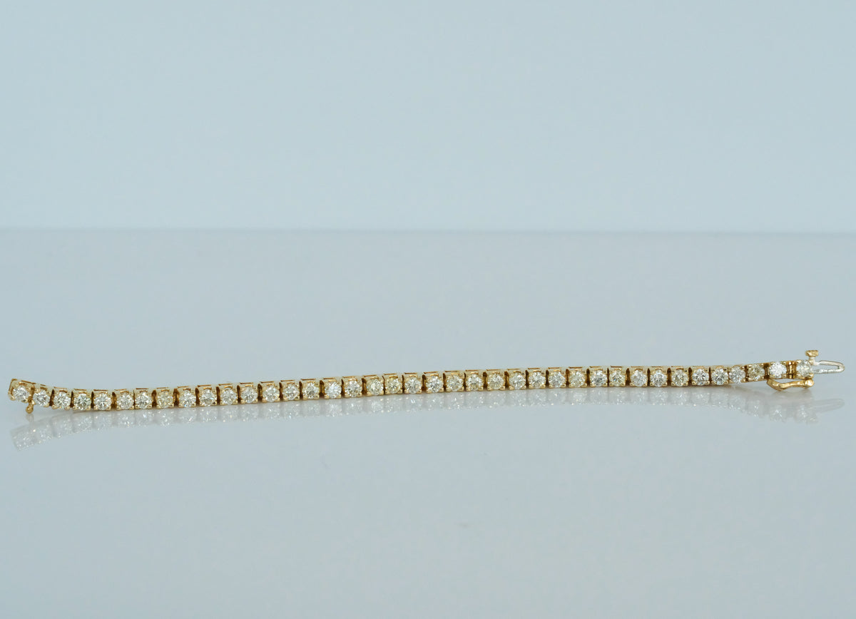 14K Yellow Gold Diamond Tennis Bracelet — 7.66 ctw - Premium Bracelet from All The Best Vintage - Just $5800! Shop now at All The Best Vintage