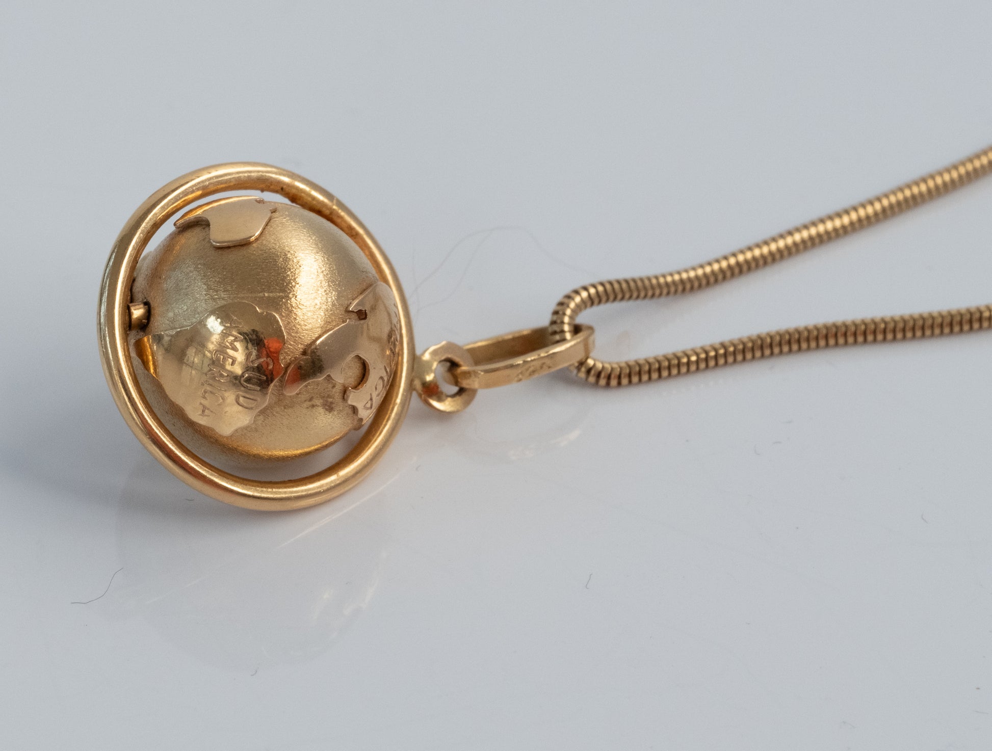 Vintage 18K Spinning Globe Pendant - 14K Snake Chain - Premium necklace from All The Best Vintage - Just $2995! Shop now at All The Best Vintage