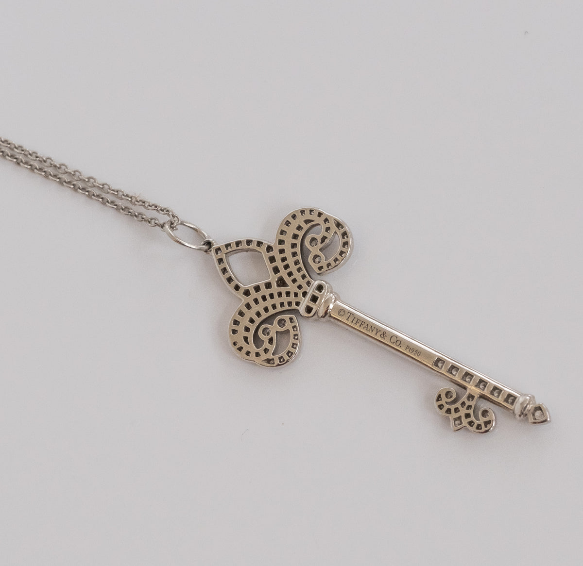 Tiffany & Co Platinum and Diamond Fleur de Lis Key and Chain. - Premium Pendant from All The Best Vintage - Just $5800! Shop now at All The Best Vintage
